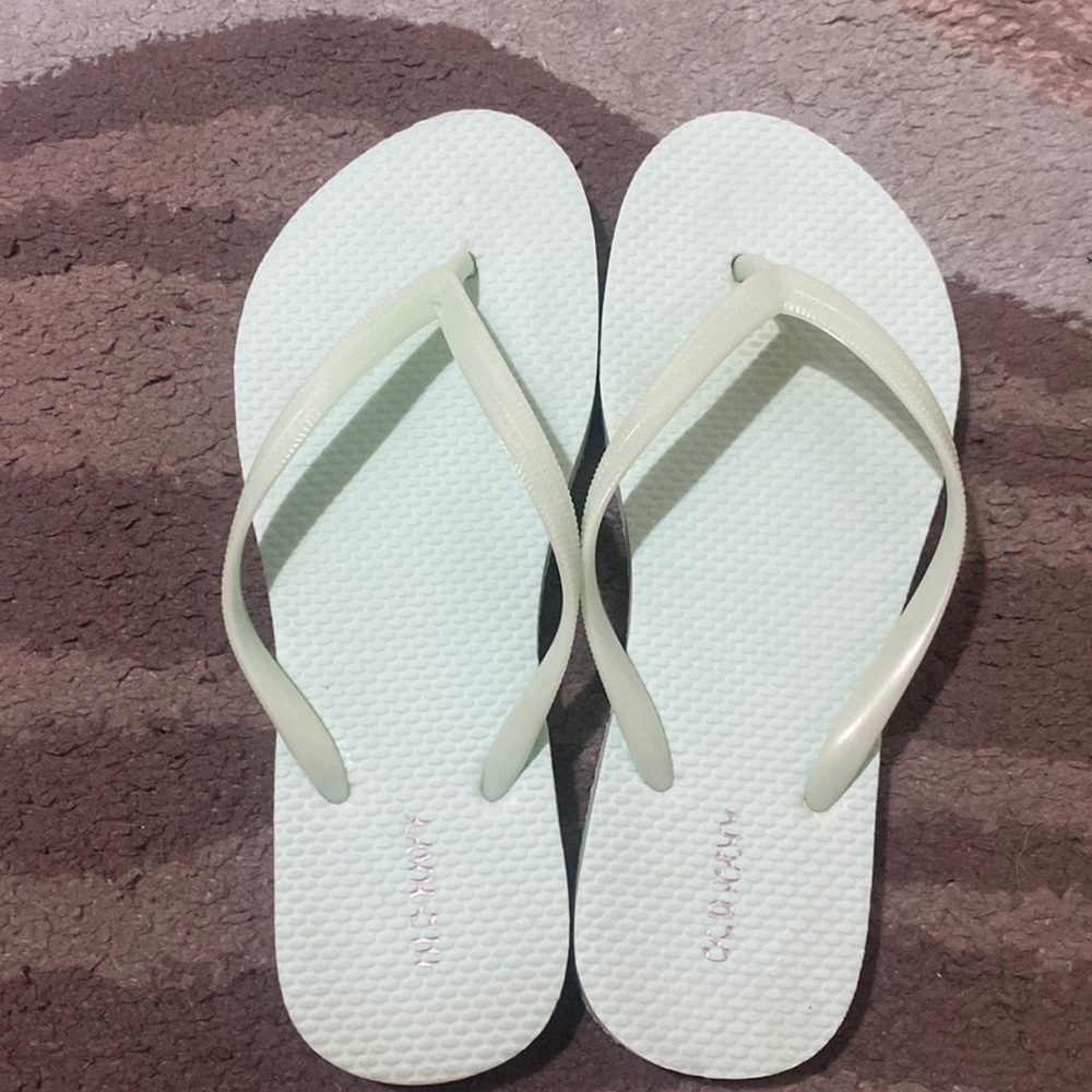 Worn) light blue old navy flip flops